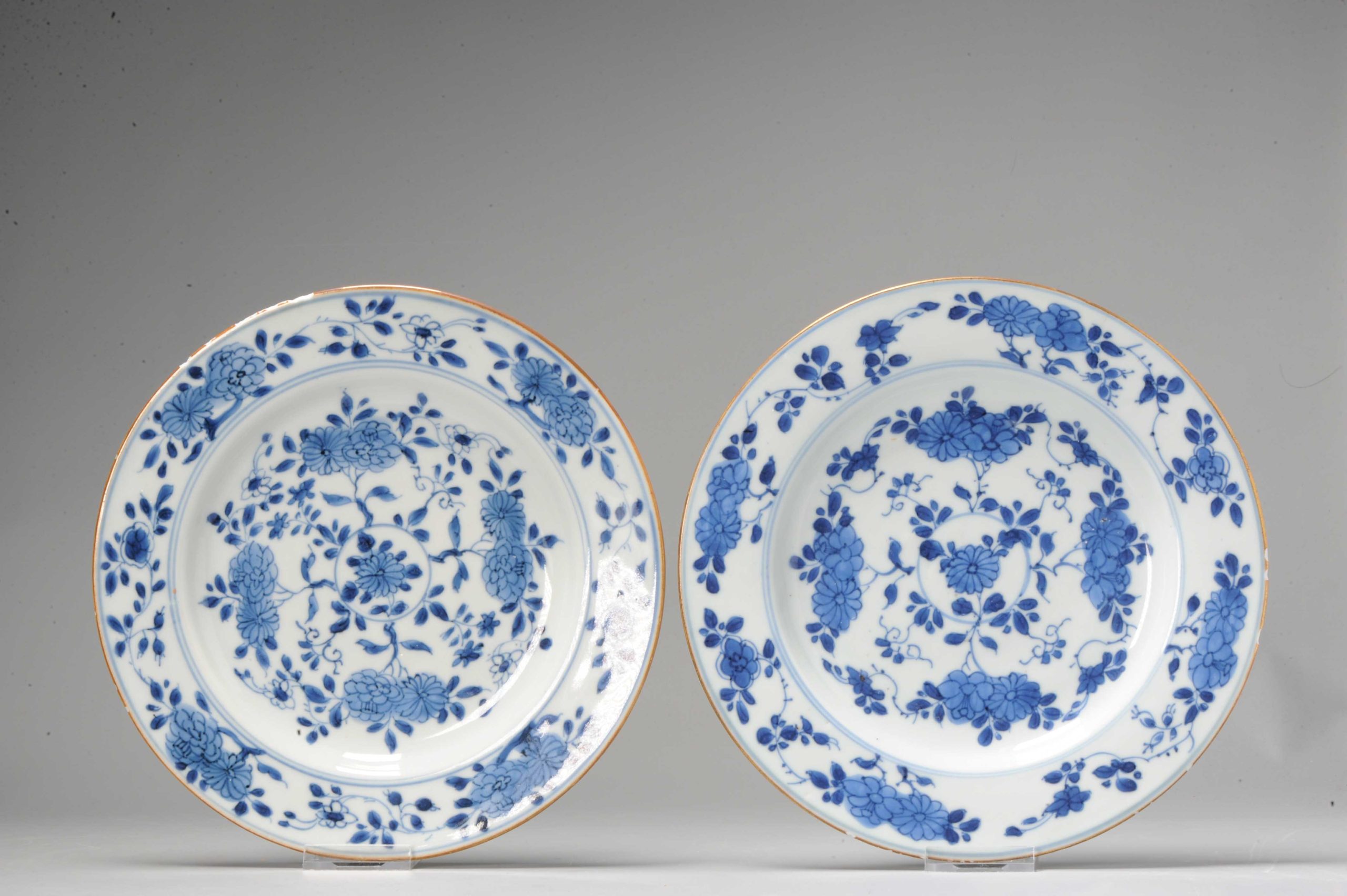 A Pair of Kangxi/Yongzheng period Chinese porcelain floral dinner landscape.