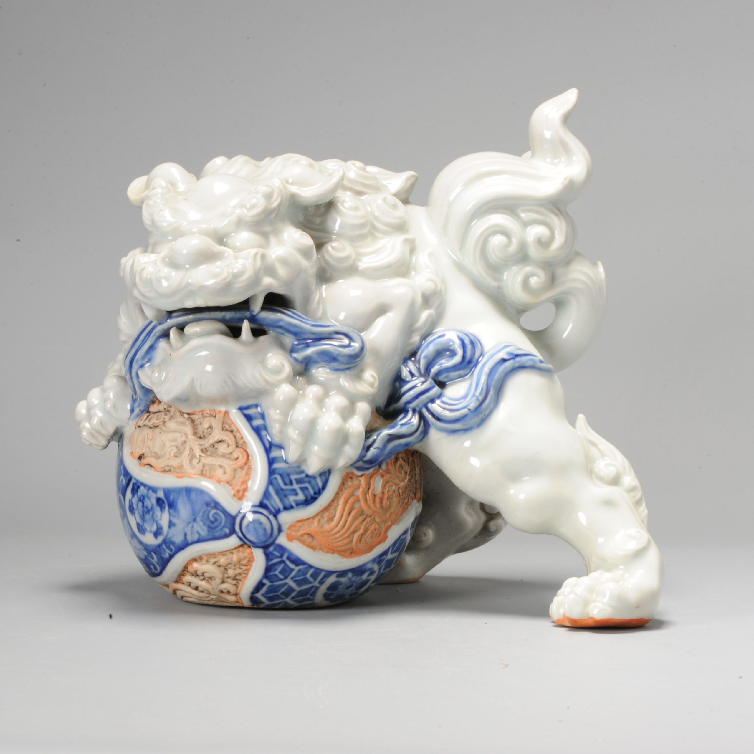 Antique Meiji Period 19C Japanese porcelain Okimono Hirado Shishi with Ball